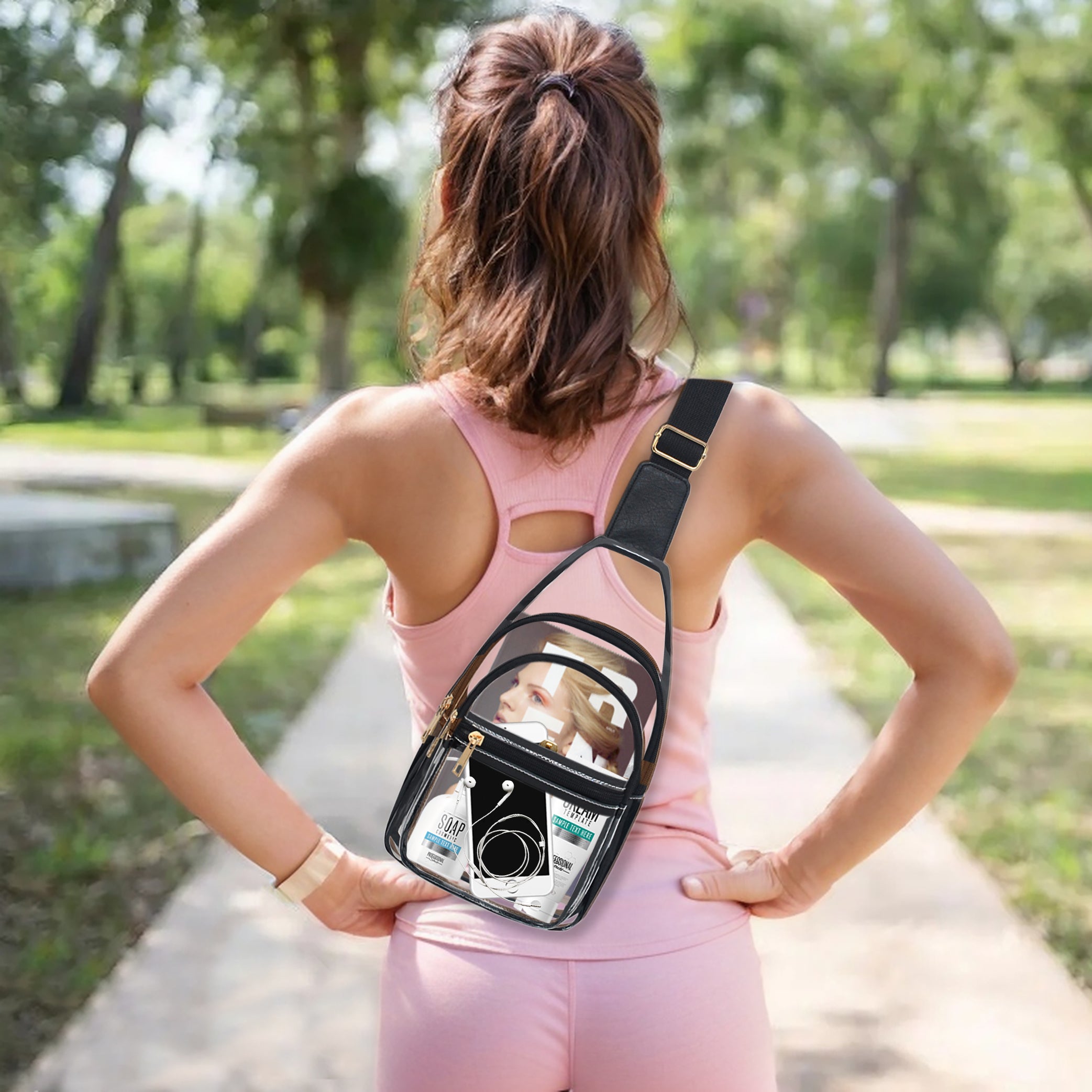 clear sling bag, fashion stadium bag, trendy concert bag, amusement park crossbody, transparent sling bag, stadium approved purse, PVC crossbody bag, clear shoulder bag, stylish stadium bag, travel concert bag, gold accent clear bag, clear sling for concerts, clear amusement park purse, everyday stadium bag, festival clear sling, hands-free concert bag, stadium fashion accessory, event-ready sling bag, sporty clear bag, chic amusement park crossbody