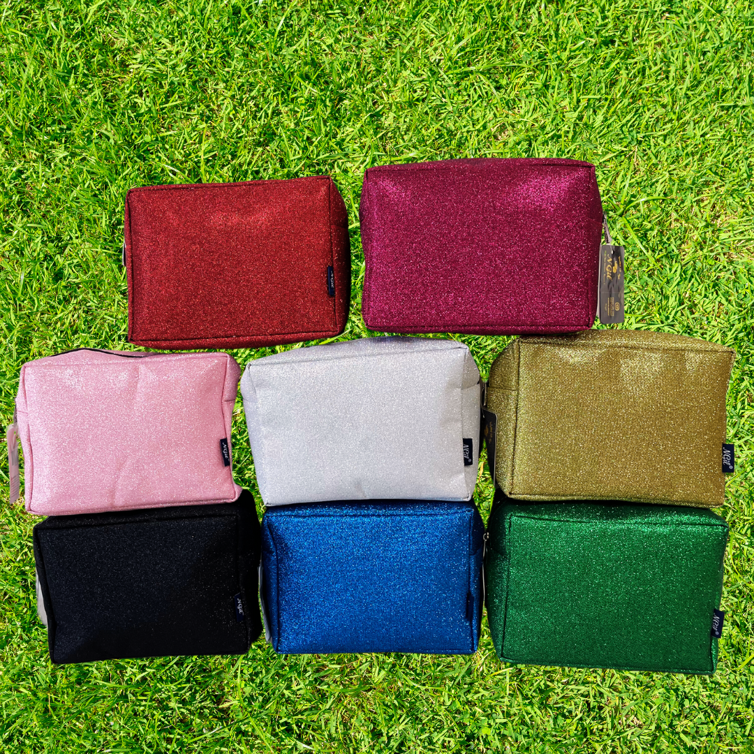 glitter cosmetic pouch, NGIL makeup bag, cheer makeup pouch, dance toiletry bag, gymnastics travel bag, beauty pageant pouch, competition cosmetic case, travel makeup organizer, glitter toiletry bag, small travel pouch, zip top cosmetic case, glitter carry-on bag, dancer makeup case, cheerleader pouch, gymnast toiletry bag, compact glitter bag, makeup bag for travel, glitter gift pouch, sparkle cosmetic bag, overnight toiletry pouch, portable beauty bag, glitter storage pouch
