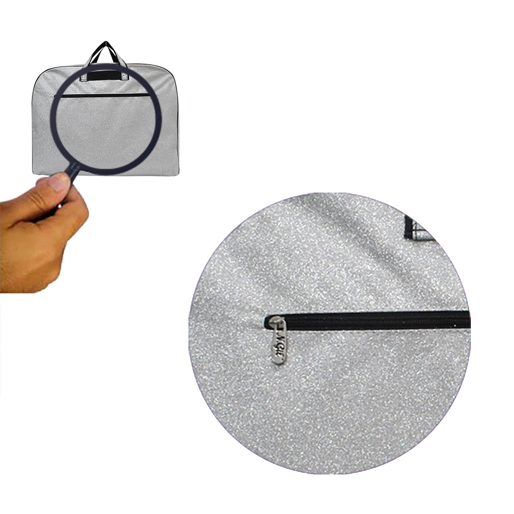 silver glitter garment bag, NGIL garment bag, dance garment bag, cheer garment bag, travel garment bag, competition garment bag, dancewear storage bag, wrinkle-free travel bag, glitter travel bag, dancer travel bag, cheerleader travel bag, monogram garment bag, foldable garment bag, lightweight dance bag, dance competition bag, glitter cheer bag, garment bag with hook, glitter clothing bag, sparkly garment bag, stylish travel bag, costume storage bag, dance outfit bag, cheer uniform bag