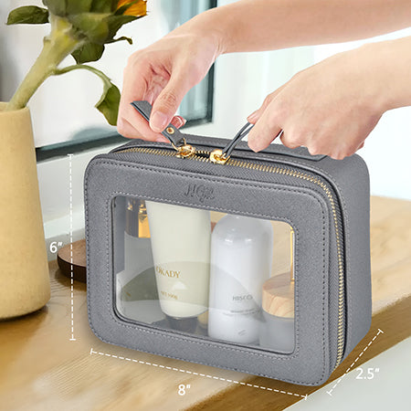 clear toiletry bag, faux leather makeup bag, TSA approved toiletry bag, clear cosmetic pouch, travel toiletry organizer, transparent makeup bag, waterproof travel bag, vegan leather toiletry bag, gym cosmetic bag, cruise travel bag, dance competition toiletry bag, road trip makeup case, golden zipper cosmetic bag, stylish clear bag, skincare travel pouch, TSA clear bag, eco-friendly cosmetic bag, clear bag with gold accents, makeup travel pouch, beauty storage organizer