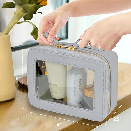 clear toiletry bag, faux leather makeup bag, TSA approved toiletry bag, clear cosmetic pouch, travel toiletry organizer, transparent makeup bag, waterproof travel bag, vegan leather toiletry bag, gym cosmetic bag, cruise travel bag, dance competition toiletry bag, road trip makeup case, golden zipper cosmetic bag, stylish clear bag, skincare travel pouch, TSA clear bag, eco-friendly cosmetic bag, clear bag with gold accents, makeup travel pouch, beauty storage organizer